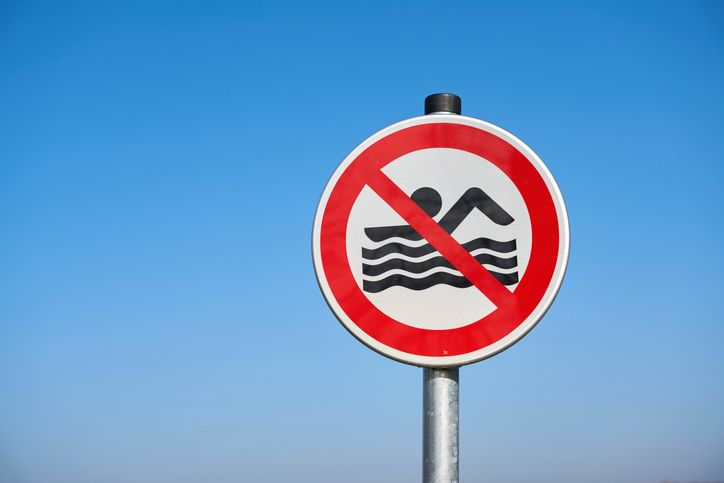 Swimming is prohibited warning sign - stock photo