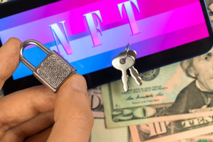 NFT ban concept. NFT with padlock and money background - stock photo