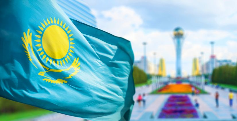 Kazakhstan flag waving in the capital city of Astana. 
