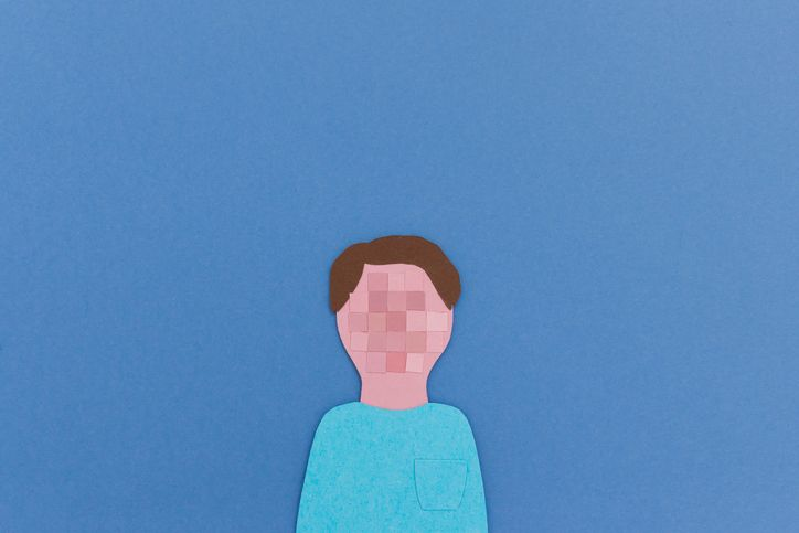 Person with pixeled face