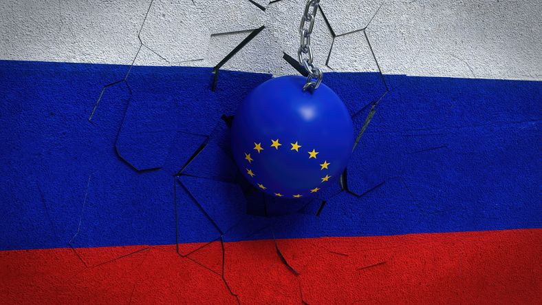 EU hammer breaking a Russian-colored wall
