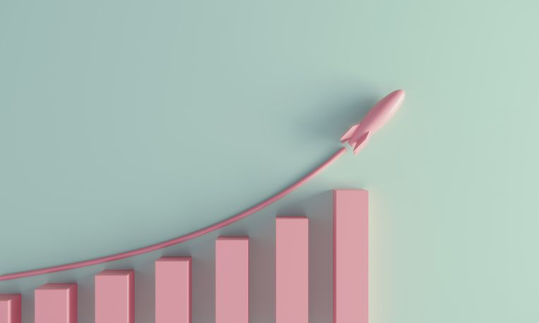 A stock image of a pink rocket flying over the pile chart.