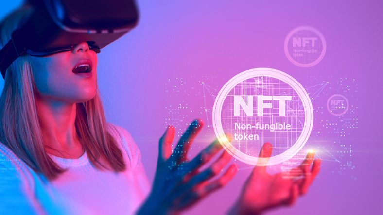 A stock photo featuring a girl wearing VR goggles and holding NFT hologram. 