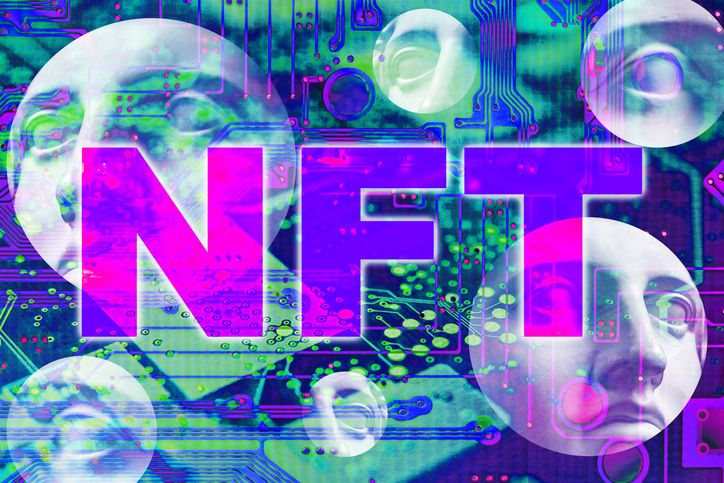A stock image of the abstract neon art with NFT abbreviation over it. 