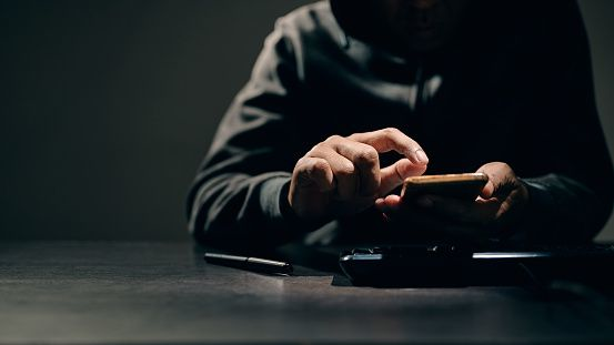 Hacker, thief is stealing data on smartphone.