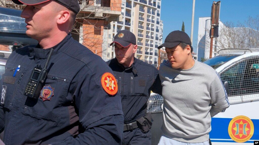 Montenegrin police officers escort fugitive Terraform Labs founder Do Kwon in Montenegro's capital Podgorica, March 24, 2023. Image: voanews.com