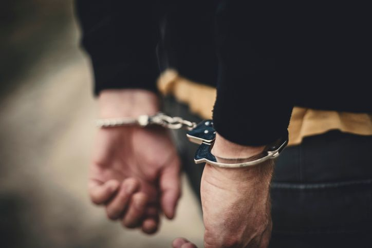 Hands in handcuffs