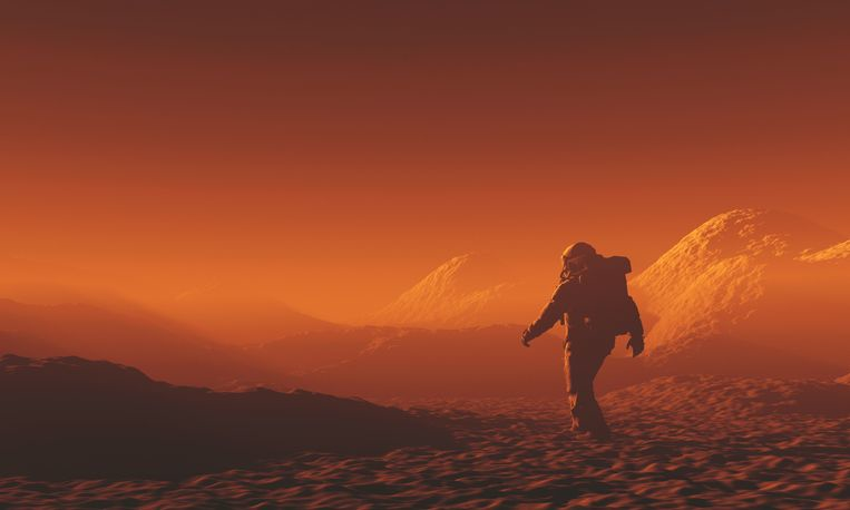 Astronaut walking in a Martian landscape
