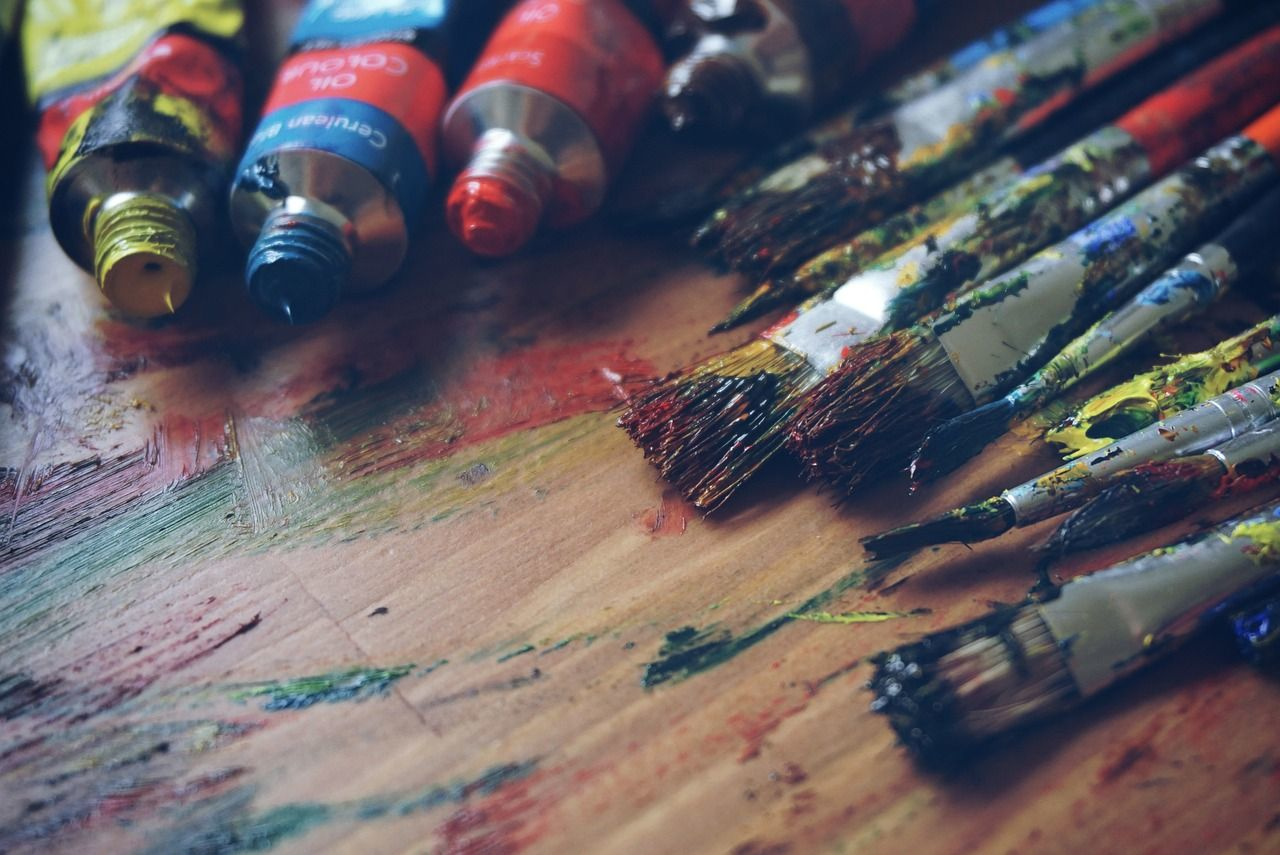 paint tubes and brushes on the table