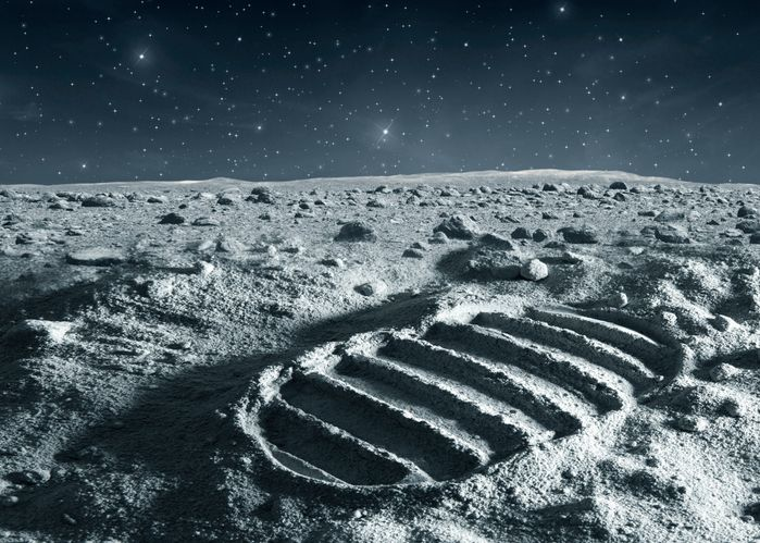 An astronaut's footprint on an empty moon