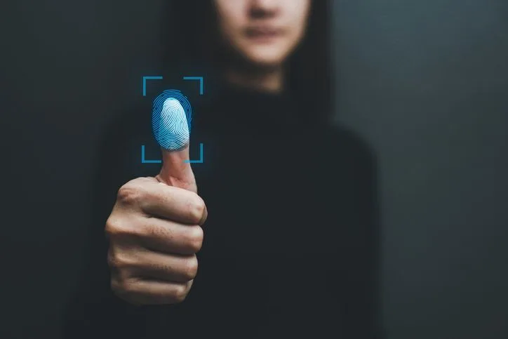 Touch screen, fingerprint scanner, biometric identity of a woman's hand in a blurred background - stock photo