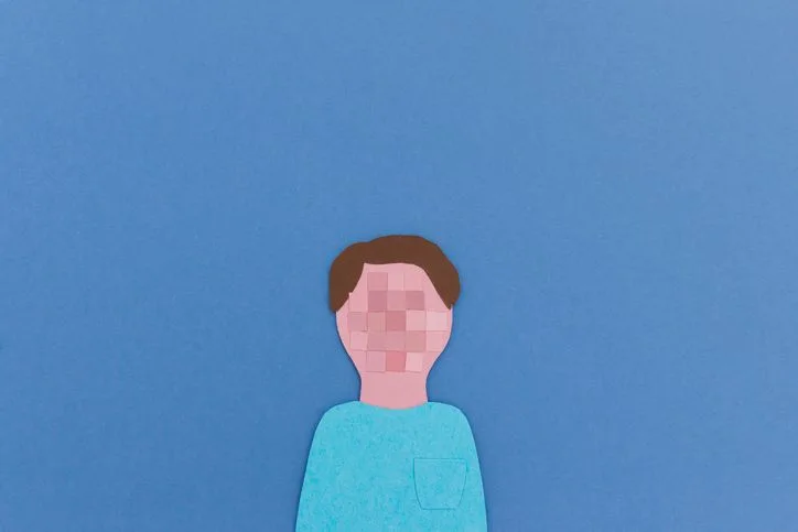 Person with pixeled face