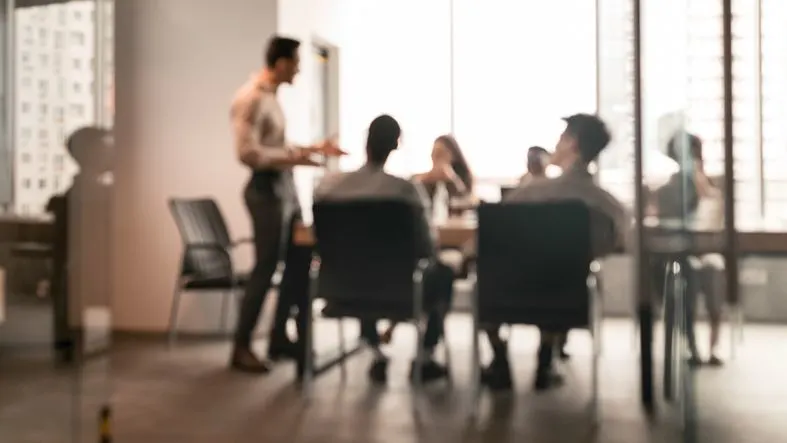 Company board arguing at a meeting