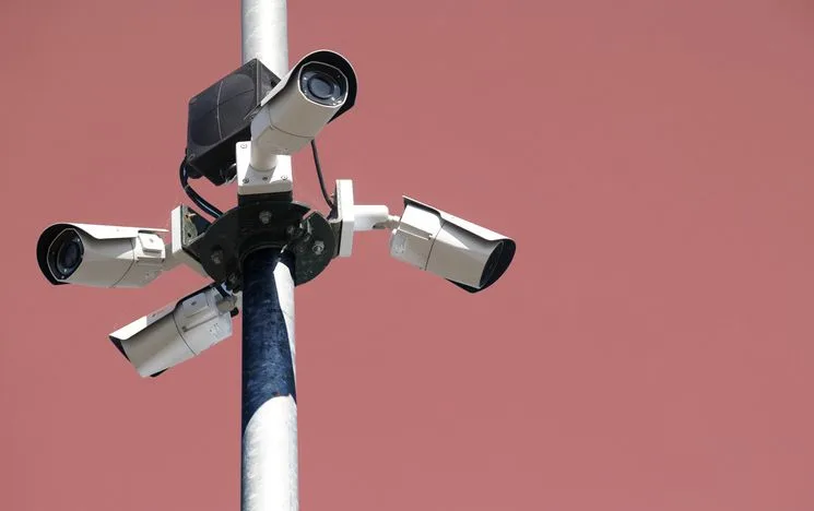 Surveillance camera - stock photo