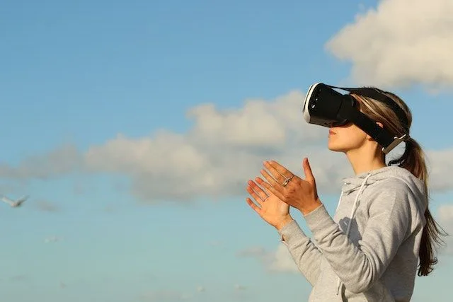 A woman wearing VR goggles.