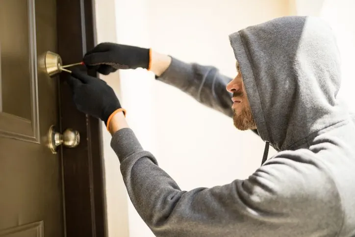 Burglar picking a lock