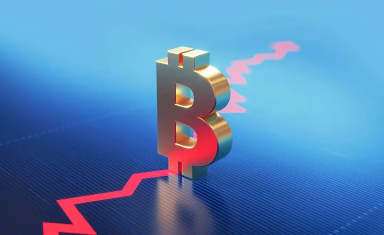A stock photo featuring golden Bitcoin symbol standing over the red down arrow. 