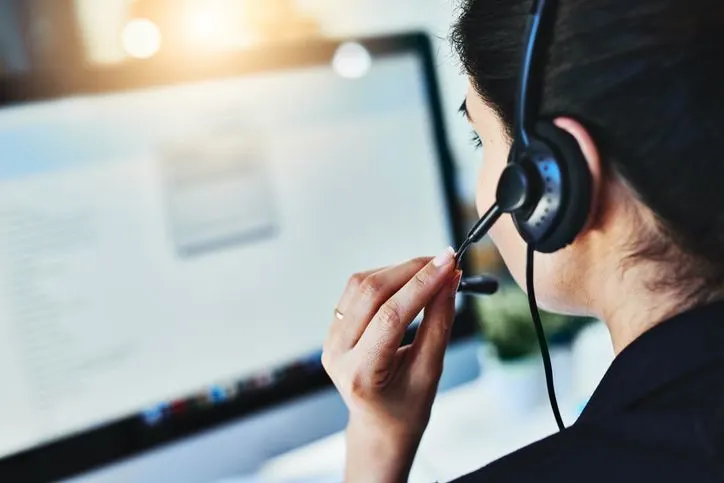 Woman wearing a hotline headset