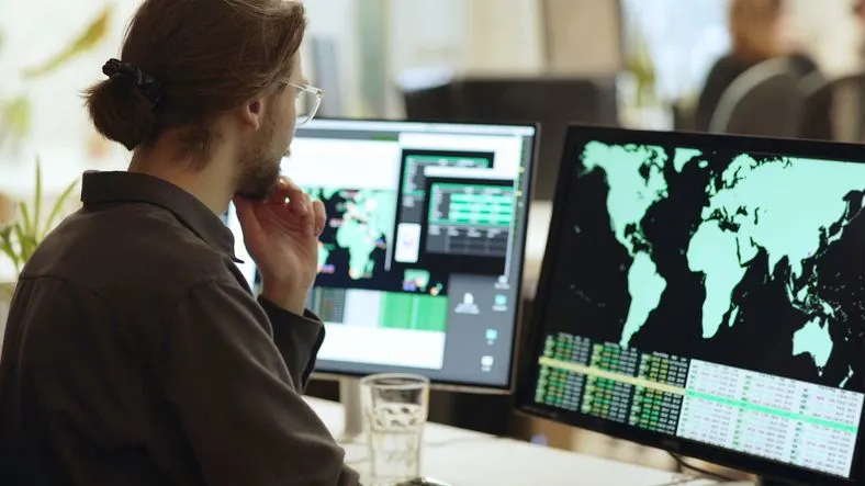 Cyber security specialist at his desk