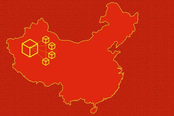 A stock image of the outline of China's borders where stars from the flag are replaced with the blockchain cubes. 