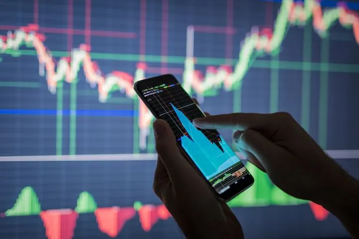 Businessman checking stock market data - stock photo