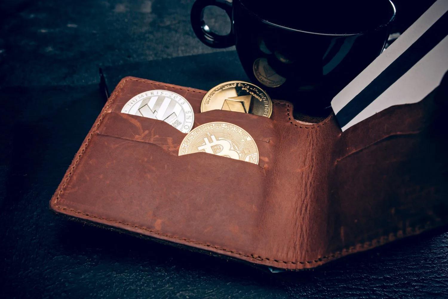 bitcoin, ethereum and litecoin in a wallet