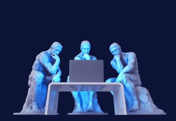 Three marble thinkers staring at a computer screen