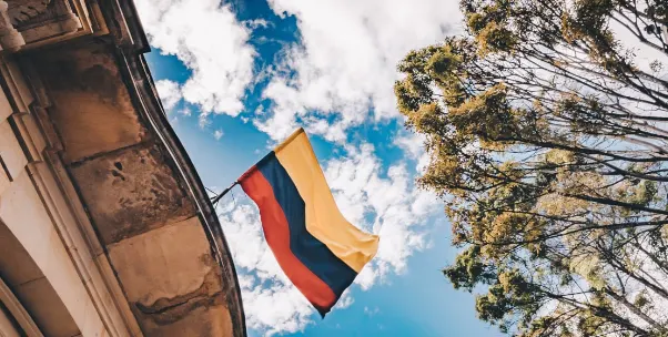 Columbian flag on top of a bank