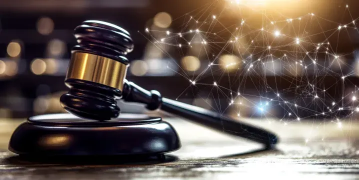 a gavel with a blockchain background