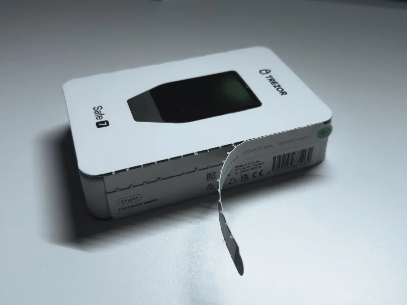 Trezor Safe 7's side sticker seals the premium package securely.