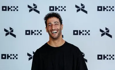 Daniel Ricciardo with the OKX logo
