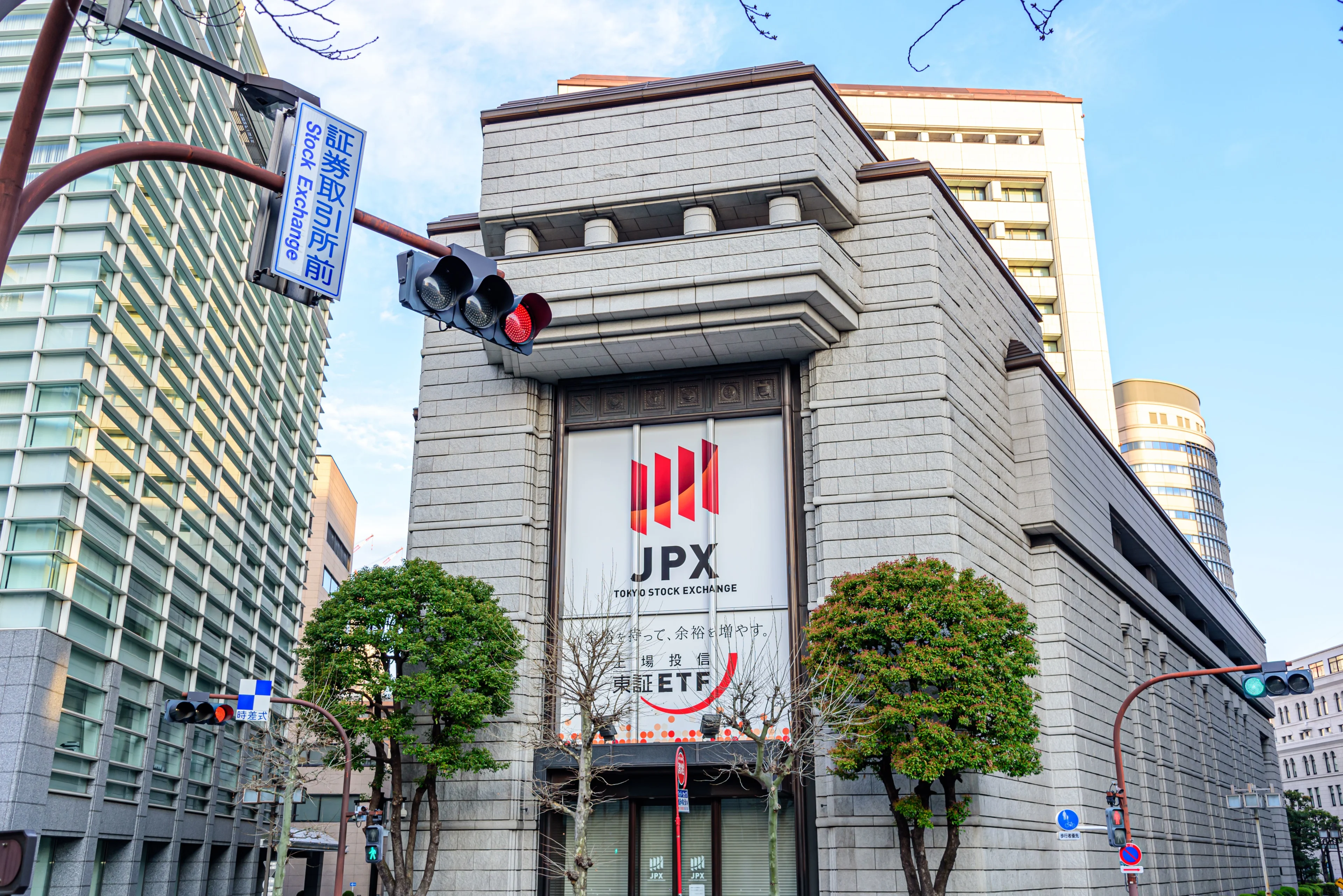 SBI Holdings Seeks Japanese Approval for Bitcoin and XRP ETFs. Source: Shutterstock
