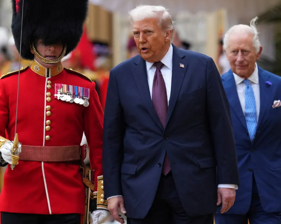 Donald Trump and King Charles review the guard of honour at Windsor Castle, 17 September 2025. Image: Kirsty Wigglesworth/Reuters