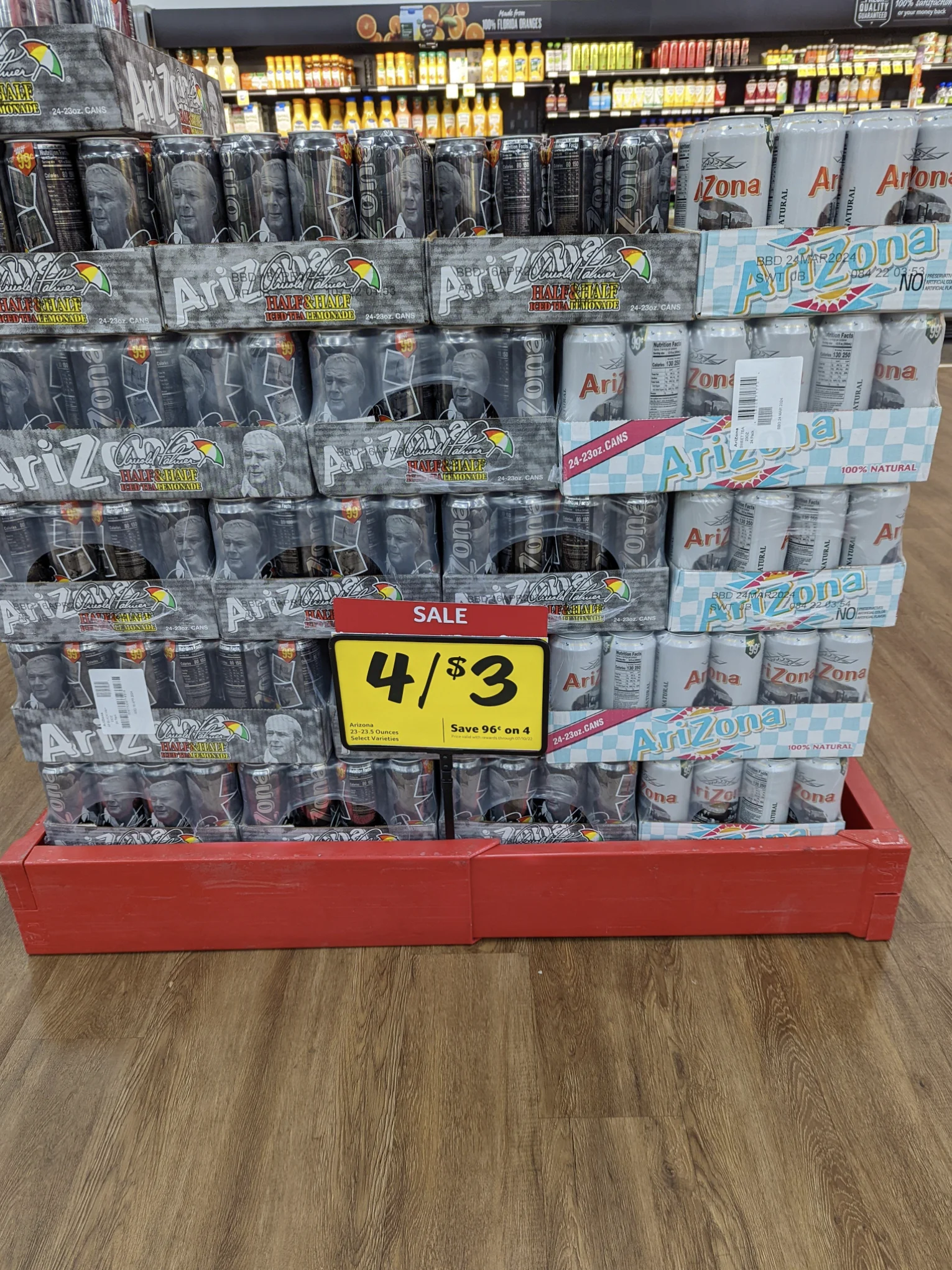 A photo of AriZona tea cans on sale. 